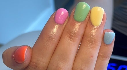 Vibrant multicolored manicure by NailsbyMichaela in Plymouth, England, GB, showcasing stunning pastel hues.