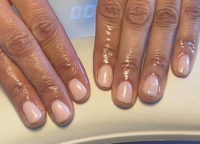 Freshly polished nails at NailsbyMichaela, Plymouth, England, GB, showcasing a sleek, glossy finish.