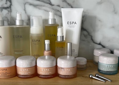 ESPA skincare products at Sacred Skin and Wellness, Kingsteignton, England. Luxurious beauty essentials on display.