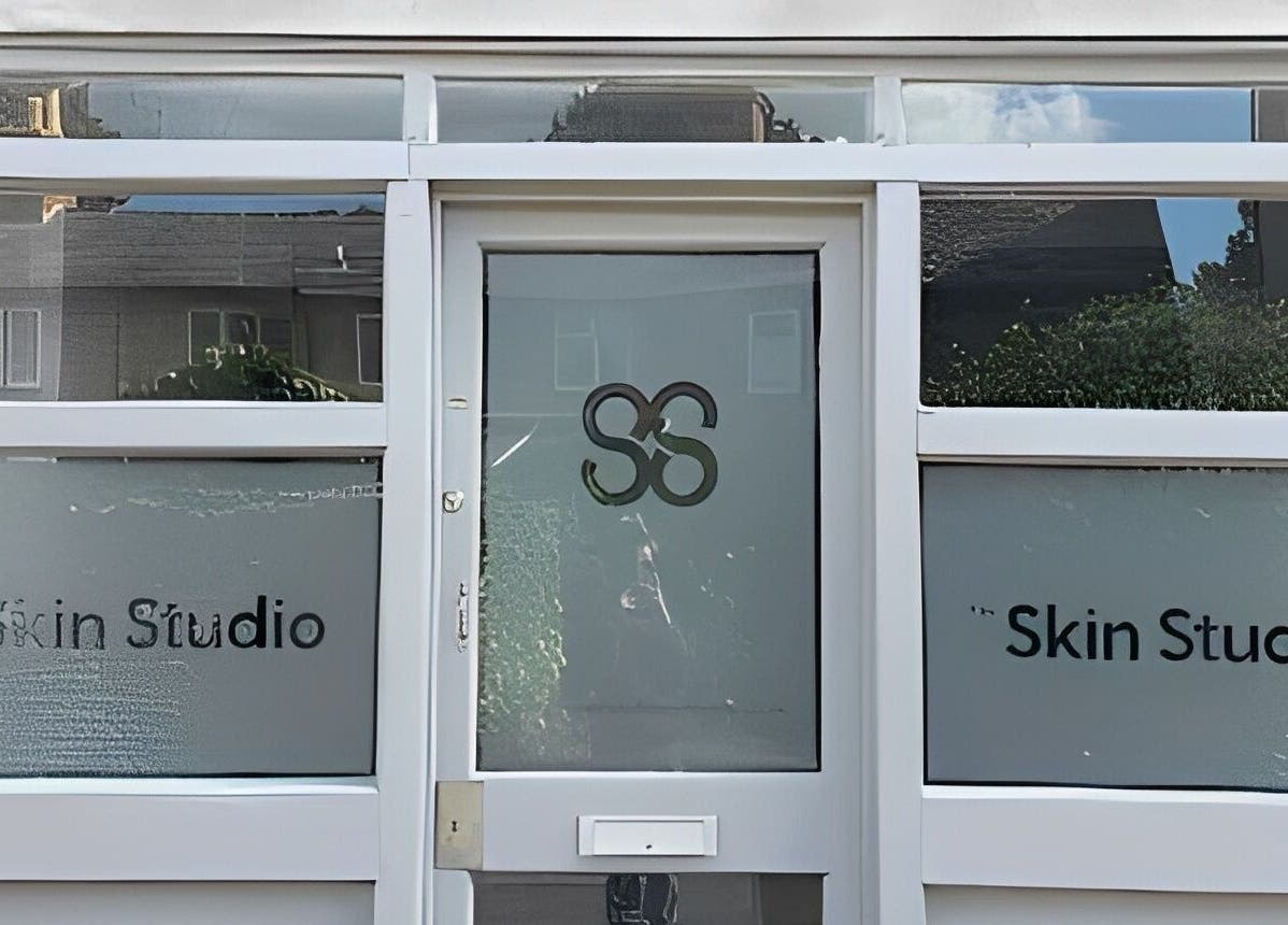 Entrance of The Skin Studio Cirencester located in Cirencester, England, GB, showcasing modern glass design.