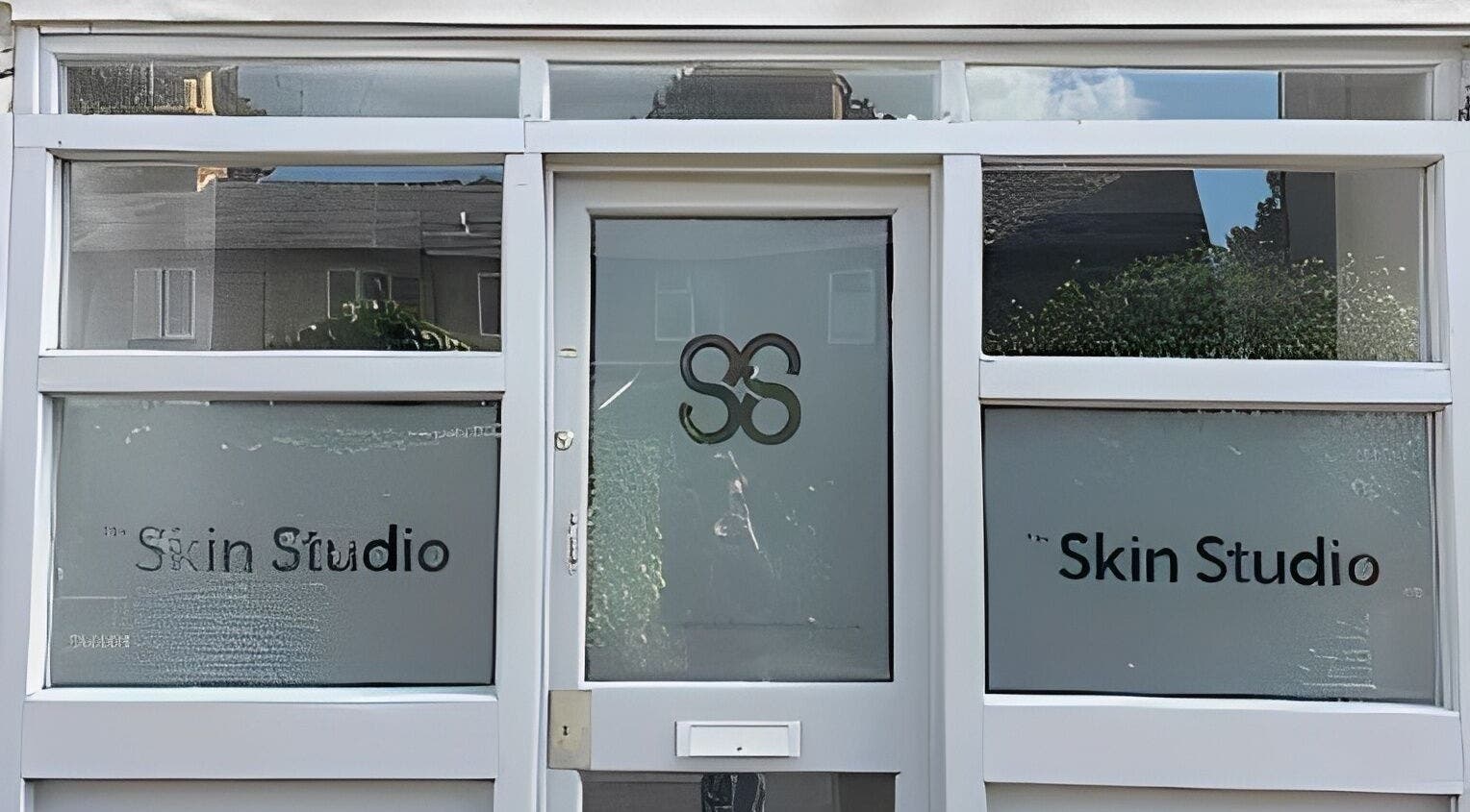 Entrance of The Skin Studio Cirencester located in Cirencester, England, GB, showcasing modern glass design.