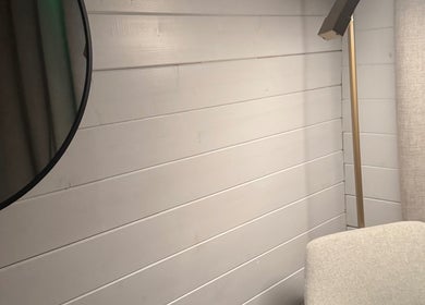 Elegant corner with mirror and chair at The Glow Room by Han, Burscough, England, GB.