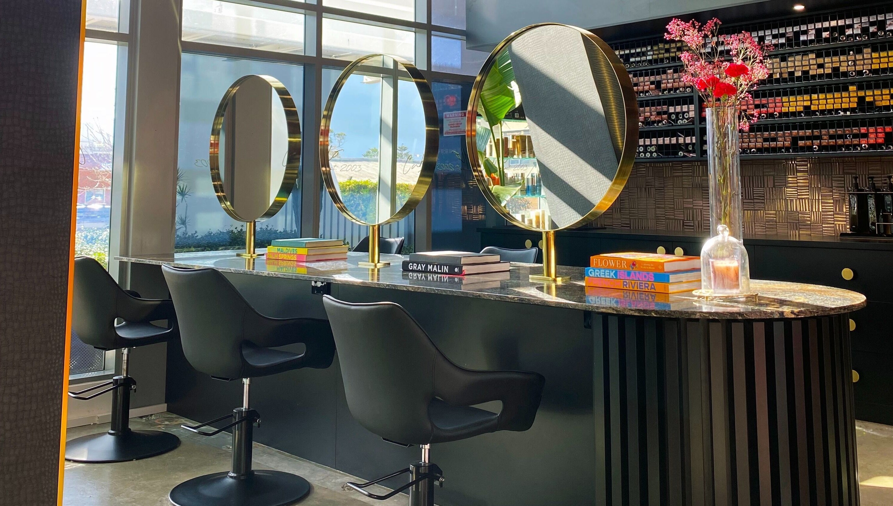 Elegant salon interior at Cabello by Stephanie Bellairs, Mandurah, Western Australia, AU with stylish mirrors.