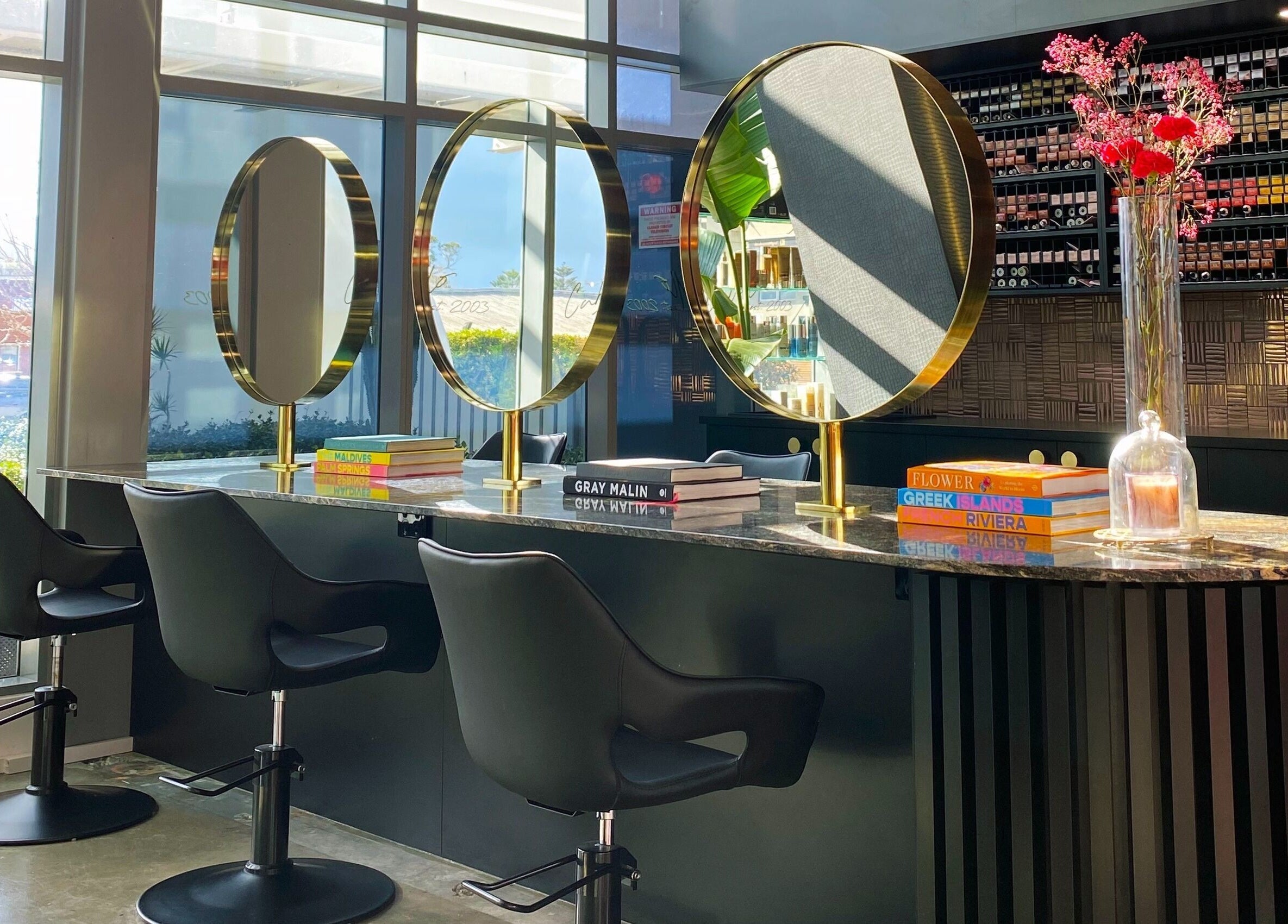 Elegant salon interior at Cabello by Stephanie Bellairs, Mandurah, Western Australia, AU with stylish mirrors.