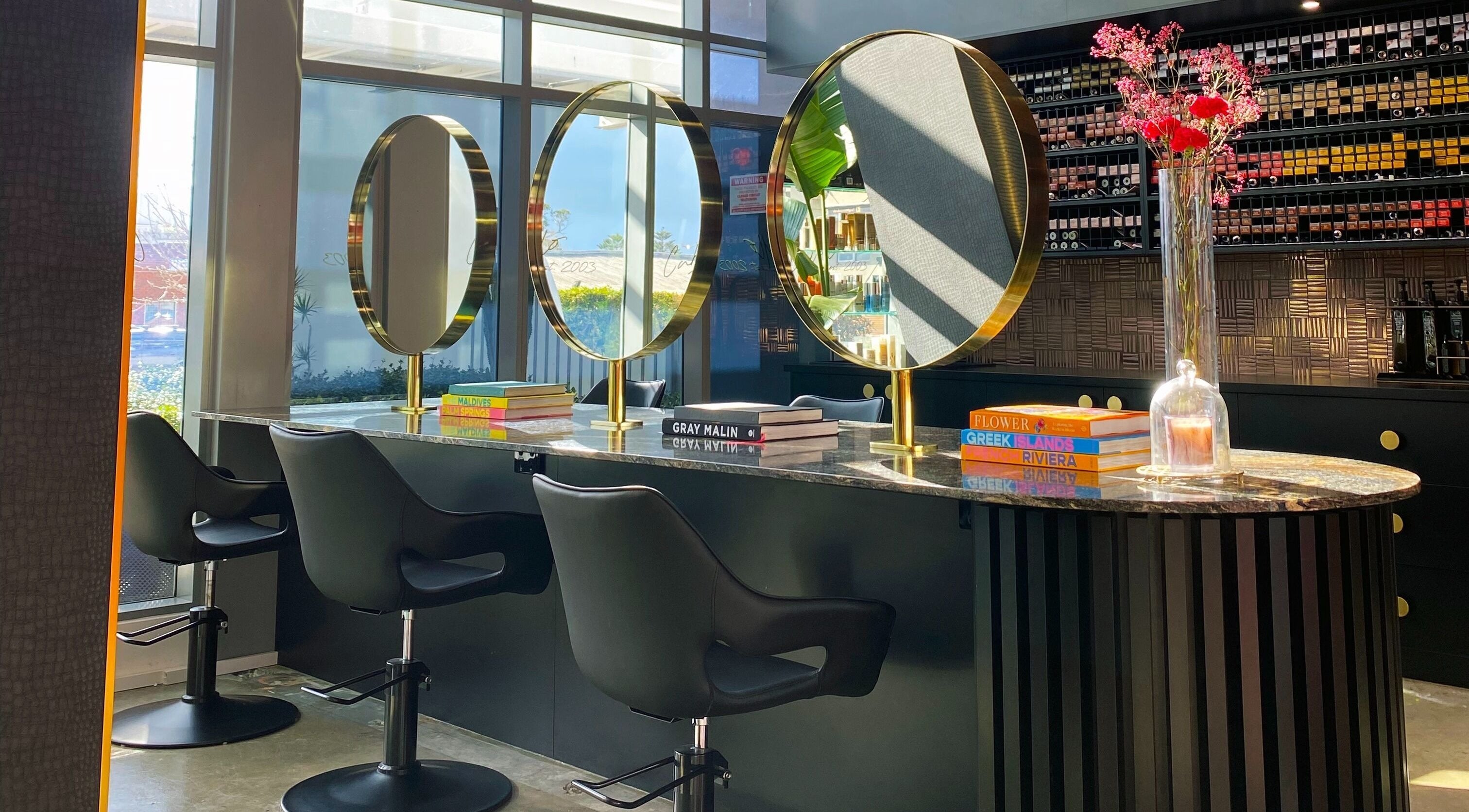 Elegant salon interior at Cabello by Stephanie Bellairs, Mandurah, Western Australia, AU with stylish mirrors.
