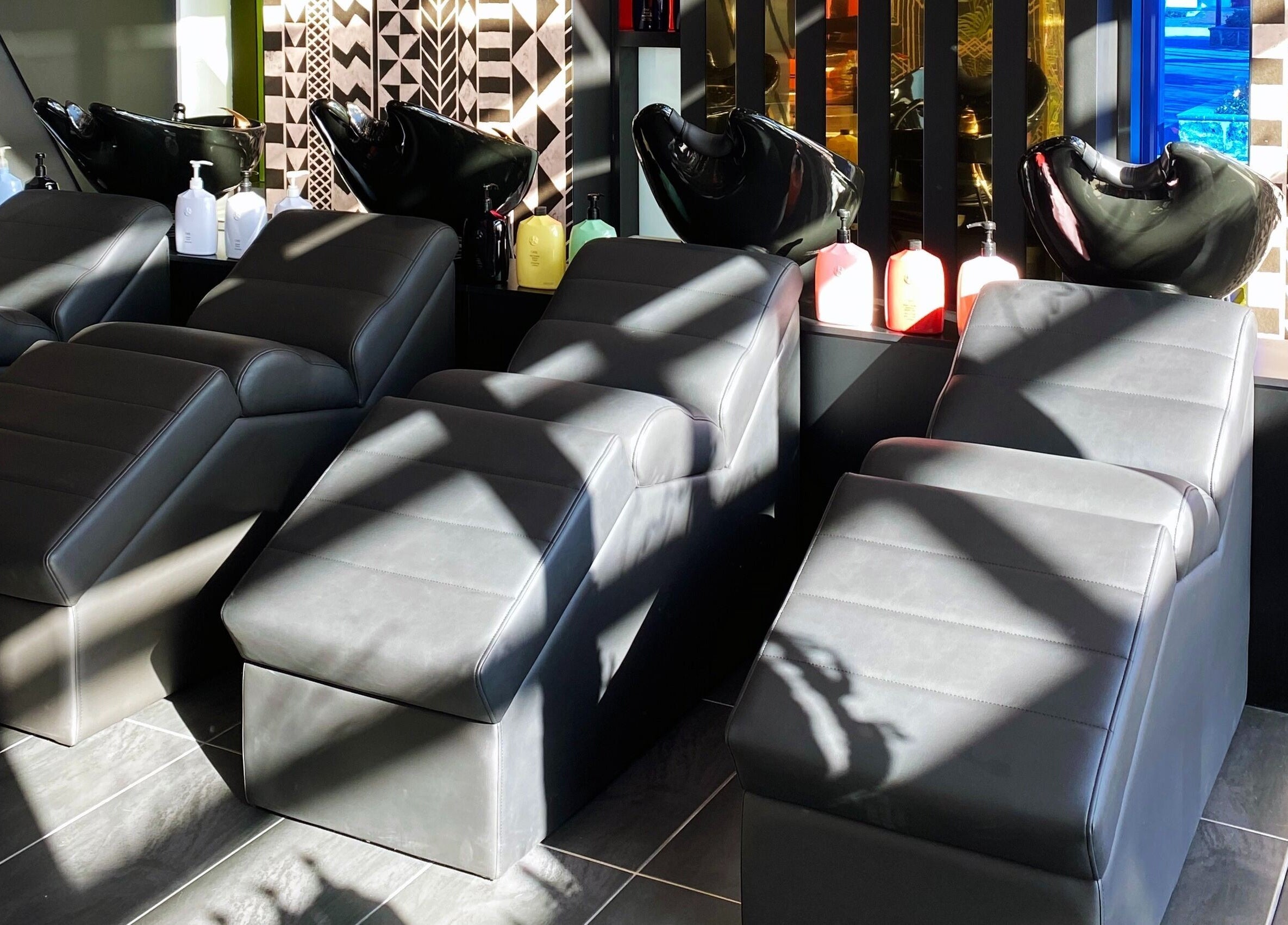 Luxurious salon chairs at Cabello by Stephanie Bellairs in Mandurah, Western Australia, AU, enhance comfort.
