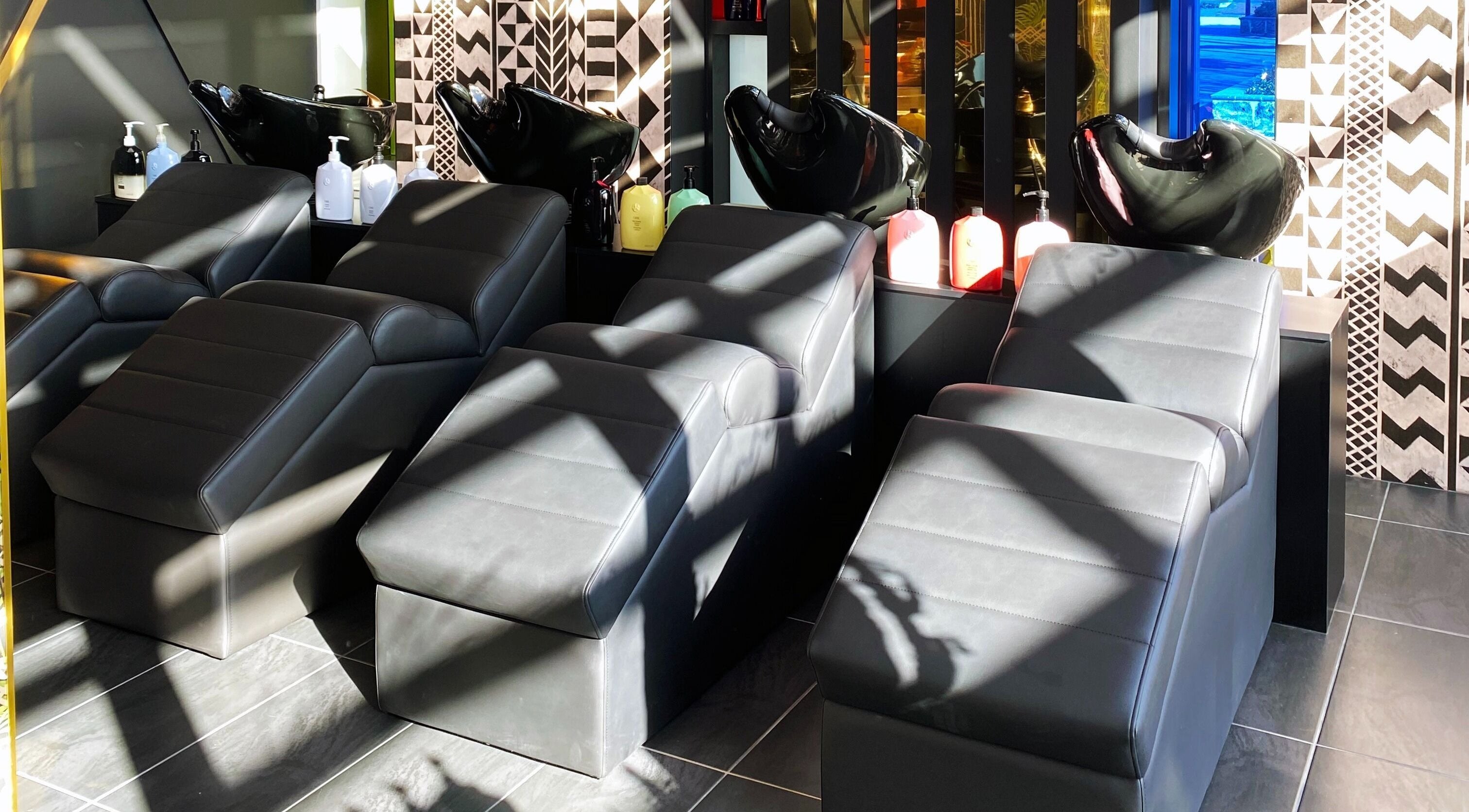 Luxurious salon chairs at Cabello by Stephanie Bellairs in Mandurah, Western Australia, AU, enhance comfort.