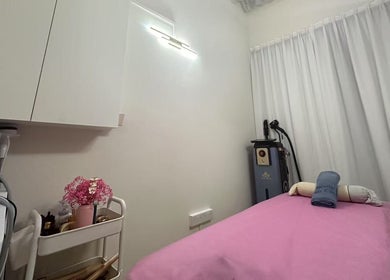 Calming treatment room at Seasonly Beauty Care, Singapore, SG. Features cozy decor and advanced spa equipment.