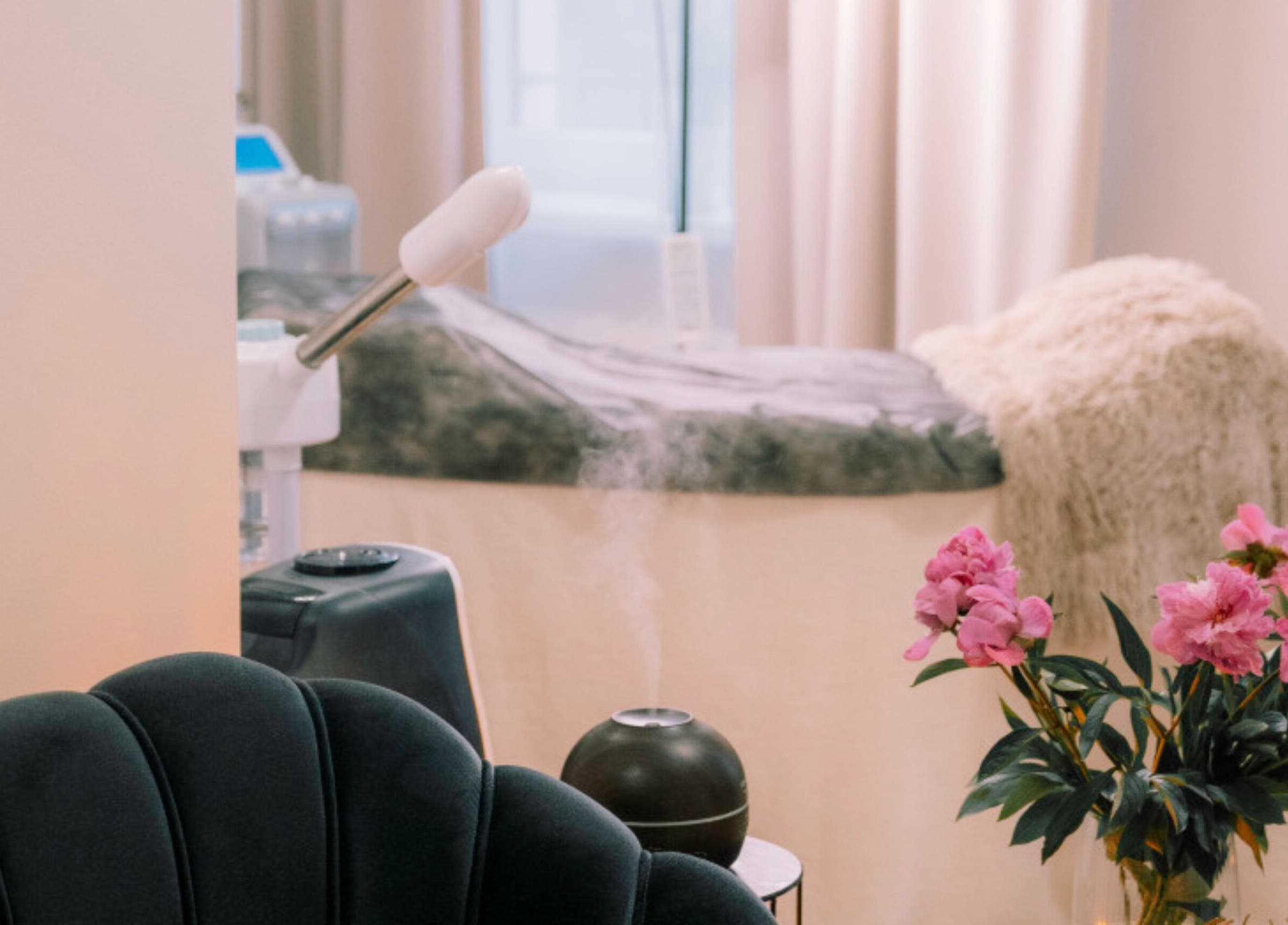 Elegant beauty and wellness corner at Ernestīnes Iela 24/Rīga, Āgenskalns, featuring plush seating and floral decor. Rīga, LV