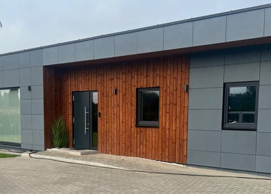 Sleek building facade at FIZIO & BEAUTY HOUSE in Mārupe, Mārupes Novads, LV.