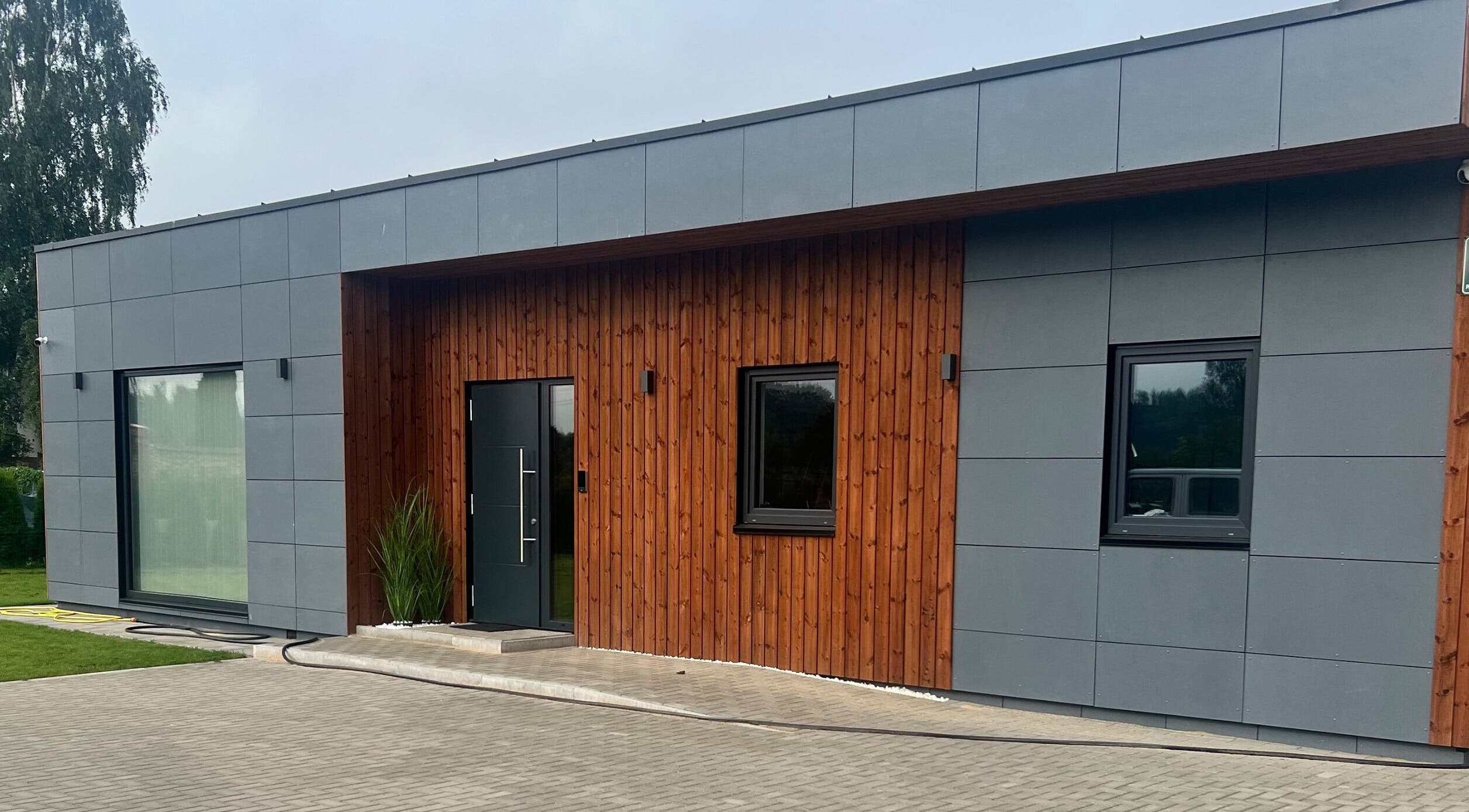 Sleek building facade at FIZIO & BEAUTY HOUSE in Mārupe, Mārupes Novads, LV.