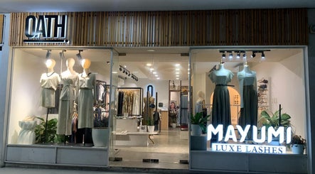Exterior view of Mayumi Luxe Lashes in Malolos, Central Luzon, PH featuring stylish mannequins and decor.
