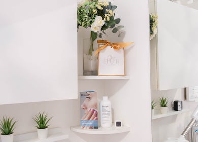 Elegant shelves at Gorgeous Faces By Gabriella, London, England, GB, showcasing skincare products and decor.