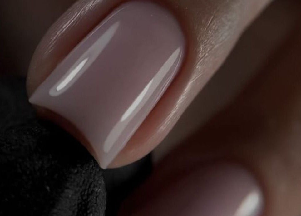 Close-up of glossy nude nails at Leilei Nail Studio, Tiranë, Qarku I Tiranës, AL.