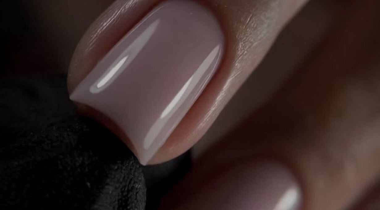Close-up of glossy nude nails at Leilei Nail Studio, Tiranë, Qarku I Tiranës, AL.