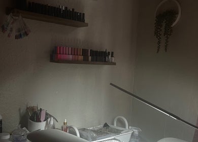 Nail supplies on shelves in Nailsnailed studio, Peterborough, England, GB.