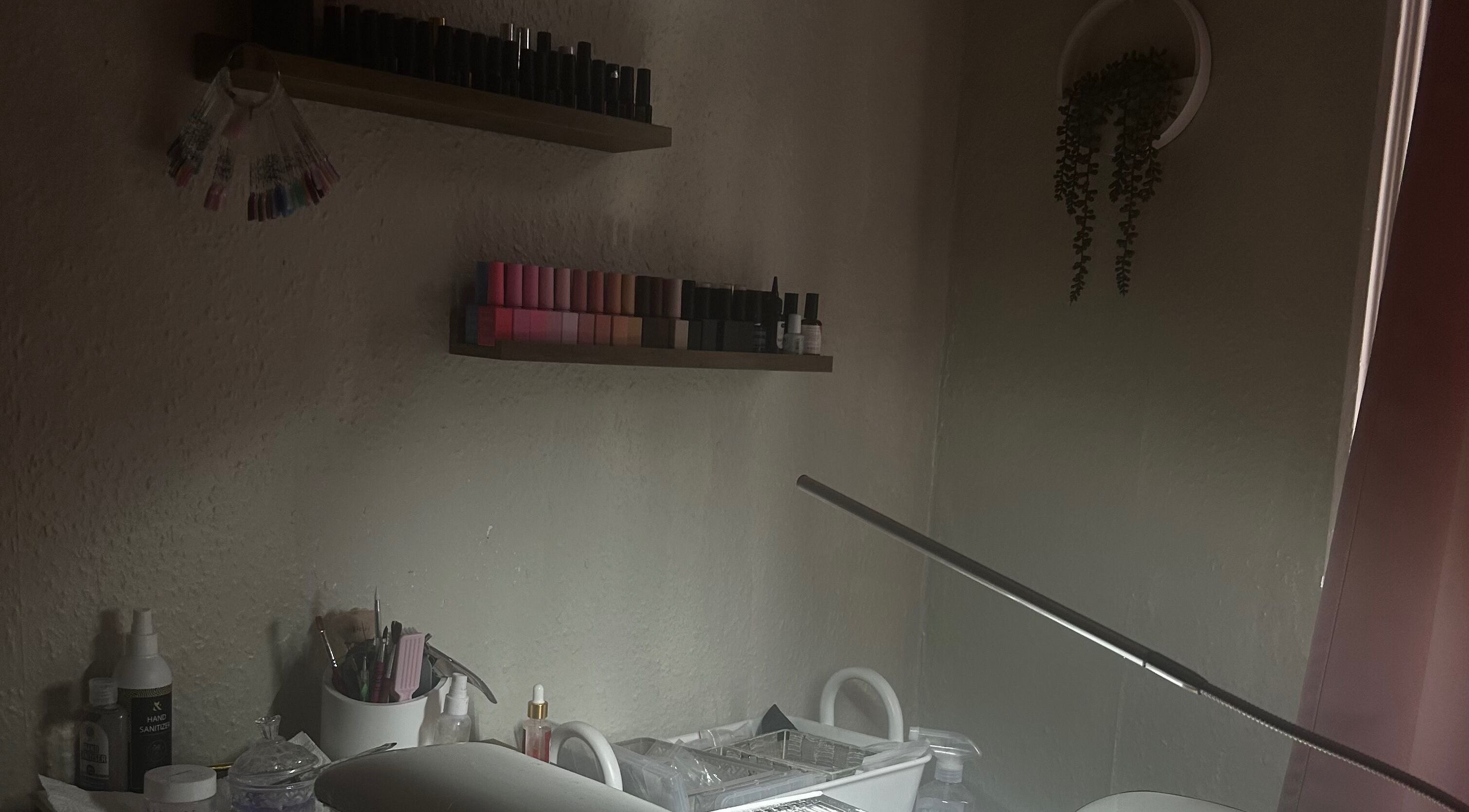 Nail supplies on shelves in Nailsnailed studio, Peterborough, England, GB.