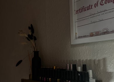 Certificate and nail polish at Nailsnailed, Peterborough, England, GB.