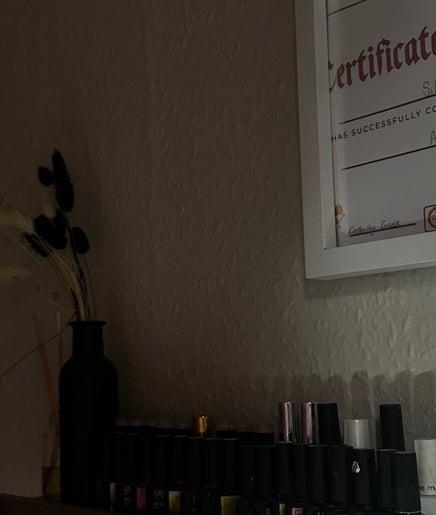 Certificate and nail polish at Nailsnailed, Peterborough, England, GB.