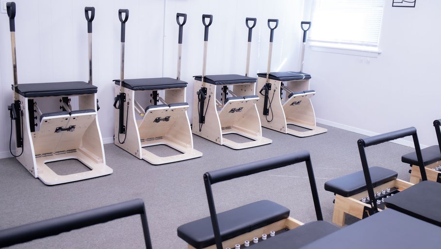 Pilates equipment at Calm And Cozy Spa, Long Branch, New Jersey, US, offering a serene workout setting.