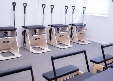 Pilates equipment at Calm And Cozy Spa, Long Branch, New Jersey, US, offering a serene workout setting.