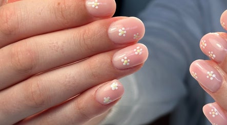 Delicate floral nail art at Kured by Kenz, Sanctuary Point, New South Wales, AU.