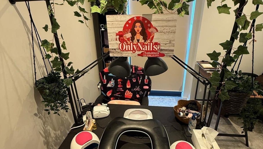 Cozy nail station at Only Nails, Milton Keynes, England, GB, with greenery and stylish decor.