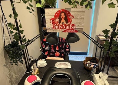 Cozy nail station at Only Nails, Milton Keynes, England, GB, with greenery and stylish decor.