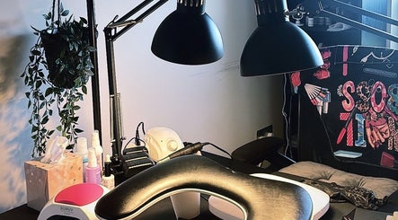 Modern nail station at Only Nails in Milton Keynes, England, GB with elegant decor and cozy lighting.