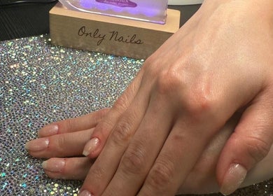 Glistening nails on a sparkling surface at Only Nails, Milton Keynes, England, GB showcasing elegance.