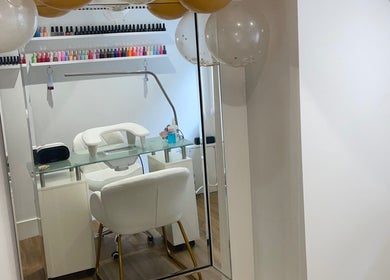 Elegant nail station at Viennas Beauty in Sevenoaks, England, GB, showcasing a stylish manicure setup.