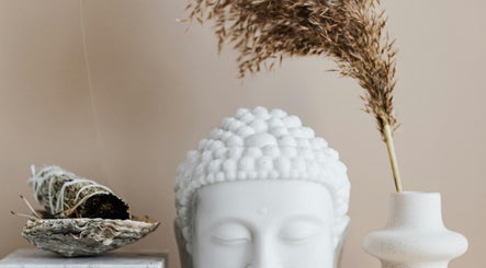 Buddha head and sage at La Rosa Blanca | Reiki & Yoga, Glasgow, Scotland, GB. Peaceful ambiance for relaxation.