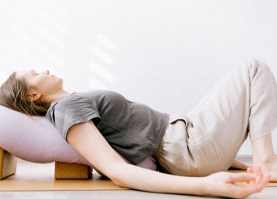 Relaxing yoga pose at La Rosa Blanca | Reiki & Yoga, Glasgow, Scotland, GB, enhancing tranquility.