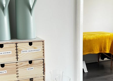 Tea and coffee station with massage table at Beauty In Simplicity, Warrington, England, GB.