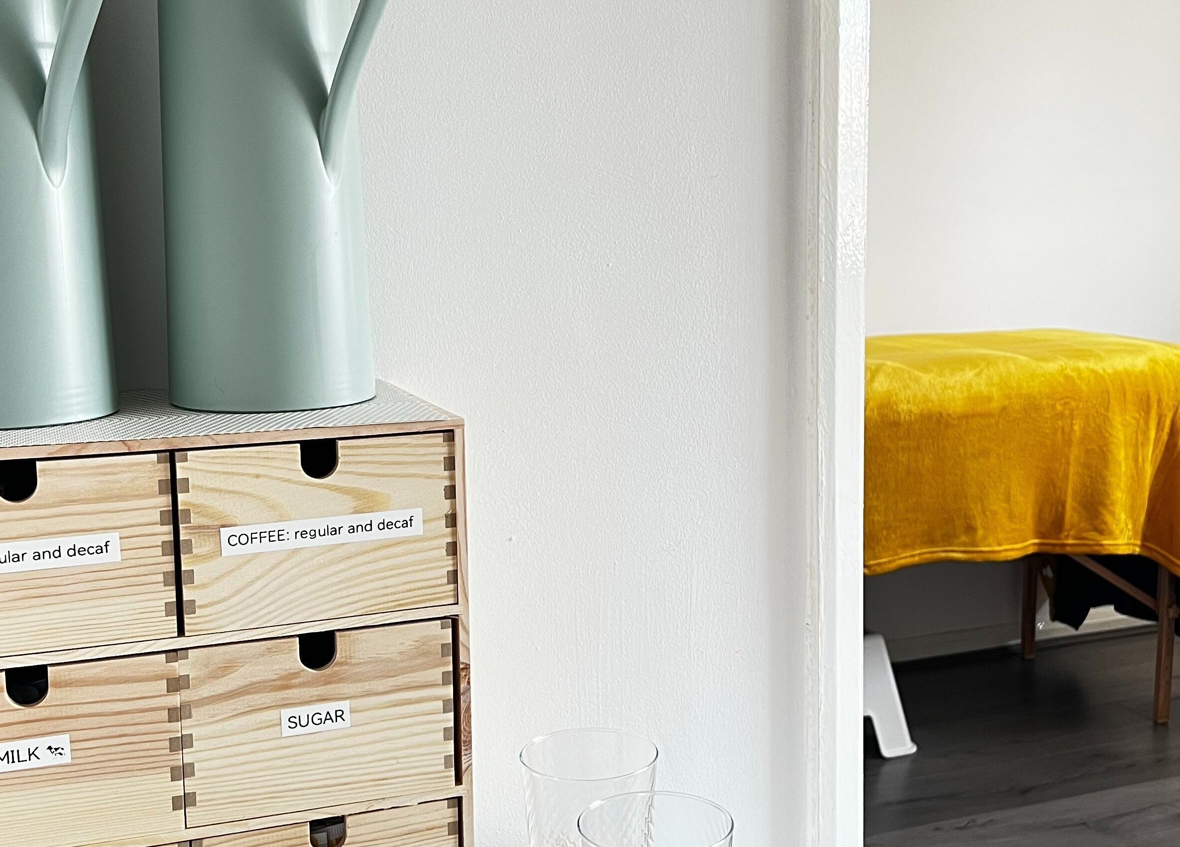 Tea and coffee station with massage table at Beauty In Simplicity, Warrington, England, GB.