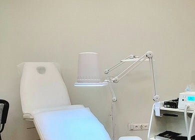 Relaxing treatment room at Estētiskais pedikīrs, Liepāja, LV, featuring soothing decor and modern equipment.