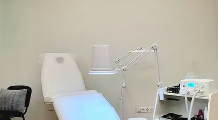 Relaxing treatment room at Estētiskais pedikīrs, Liepāja, LV, featuring soothing decor and modern equipment.