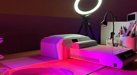 Nails Gelato nail station with UV lamp in Melbourne, Victoria, AU, creating a vibrant ambiance.