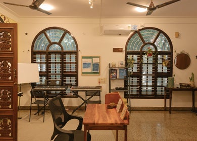 Inviting music room at Solo Music Lessons, Bengaluru, Karnataka, IN with keyboards and elegant decor.