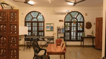 Inviting music room at Solo Music Lessons, Bengaluru, Karnataka, IN with keyboards and elegant decor.