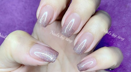 Glittery nude nails design by Nails By Ting located in Singapore, Singapore, SG.