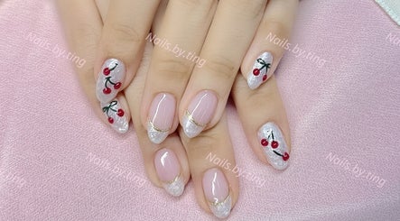 Cherry nail art at Nails By Ting, Singapore, Singapore, SG. Elegant designs on well-manicured hands.