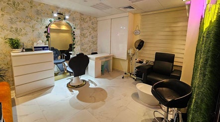 Elegant interior of Renu Sachdeva Beauty Saloon in Abu Dhabi, AE showcasing modern furnishings and stylish decor.