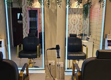Modern salon chairs and mirrors at Renu Sachdeva Beauty Saloon, Abu Dhabi, Abu Dhabi, AE, showcasing elegance.