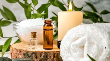 Relaxing spa setup with candle and oils at Shinrin-Yoku Spa, Bamfield, British Columbia, CA.