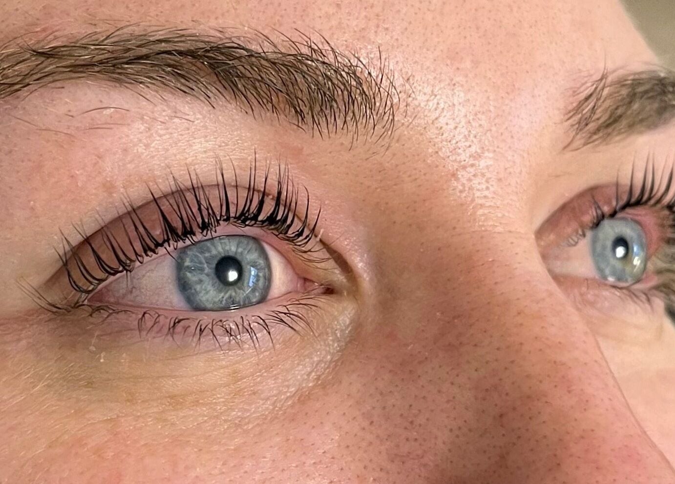 Close-up of expertly styled eyelashes at Cured. By Olivia, Cardiff, Wales, GB for a stunning beauty transformation.
