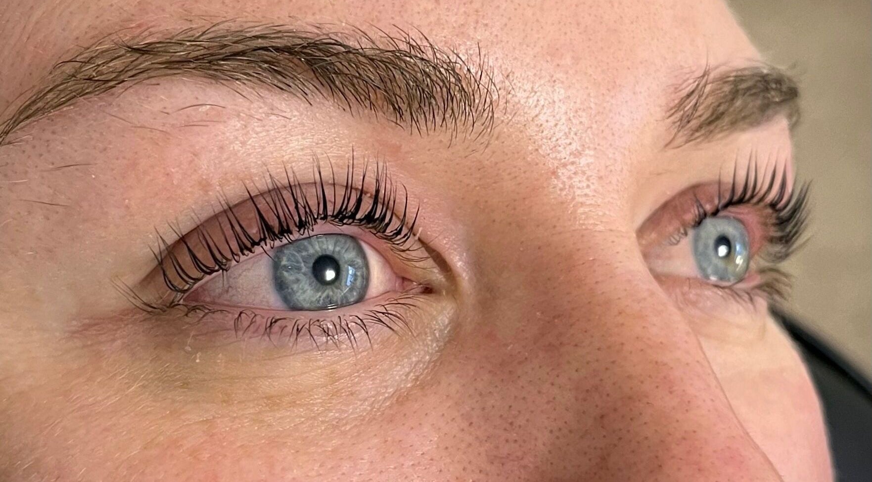 Close-up of expertly styled eyelashes at Cured. By Olivia, Cardiff, Wales, GB for a stunning beauty transformation.