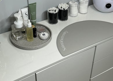 Beauty products on counter at The Brow Studio Llanelli, Llanelli, Wales, GB, showcasing elegance and care.