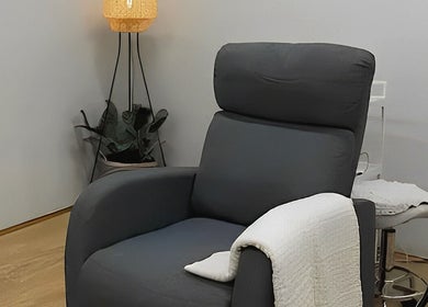 Comfortable chair at MIU MIU EYELASHES, Sydney, New South Wales, AU, creates a tranquil atmosphere for relaxation.