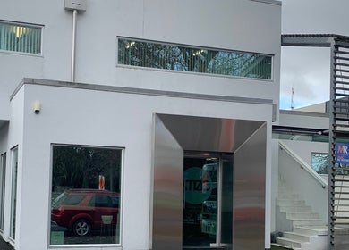 Contemporary exterior of Soul Peach, Hamilton, Waikato Region, NZ, showcasing sleek design.
